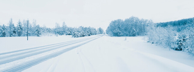 snowy winter forest road background