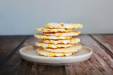 dry cookies from air rice and corn on a decorative plate