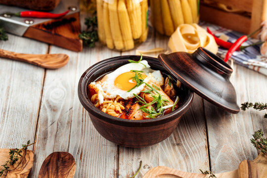 Hot korean chocken ramen noodles with fried egg