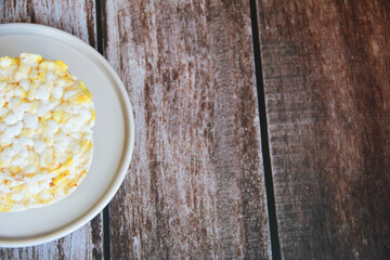 dry cookies from air rice and corn on a decorative plate