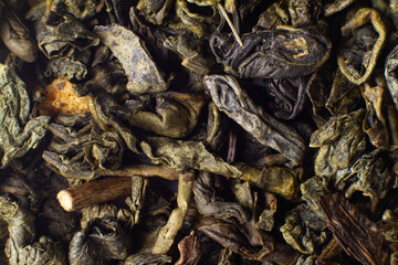 Macro photo of green leaf tea. Chinese tea, oolong, caffeine