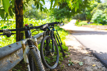 closeup mountain bike with soft-focus in the background. over light