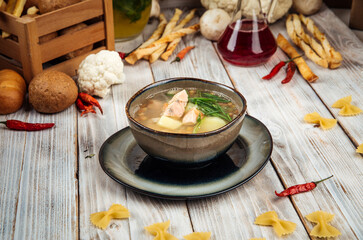 Side view on homemade royal fish red fish soup