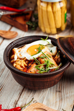 Hot korean chocken ramen noodles with fried egg