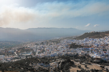 Street with stairs in Medina of Chefchaouen, Morocco. Chefchaouen or Chaouen is known that the houses in this old town are painted in the striking, variously blue hued
