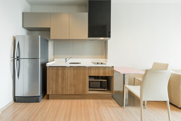 Modern kitchen interior with electric and microwave oven