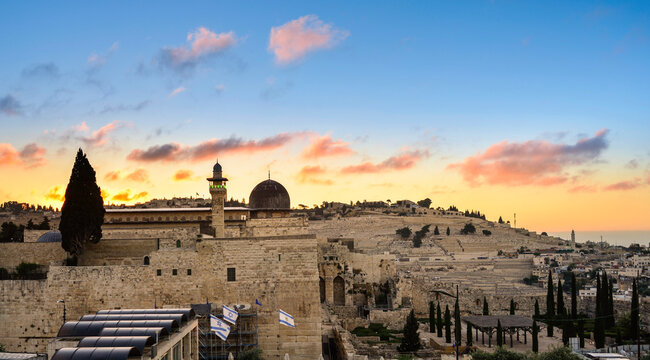 Beautiful sunrise over the Mount of Olives, Al Aqsa Mosque and the Umayyad Palace site at the Jerusalem archaeological park, which includes remains of First and Second Temple, and early Muslim periods