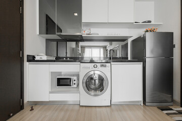 Modern kitchen interior with electric and microwave oven