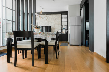 Modern living room and kitchen in small apartment 