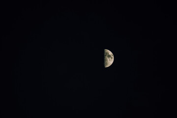 Photograph of the moon in its crescent state.