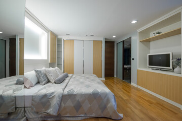 Fototapeta na wymiar White bedroom interior ,cozy space
