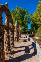 Fototapeta premium The Santa Cruz River Lined With Masonry Crosses, Sanctuario de Chimayo, Chimayo ,New Mexico,USA