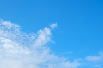 Blue sky background with clouds during moring sunrise.