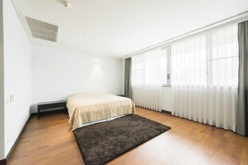 Bright Interior of cozy bedroom in modern design