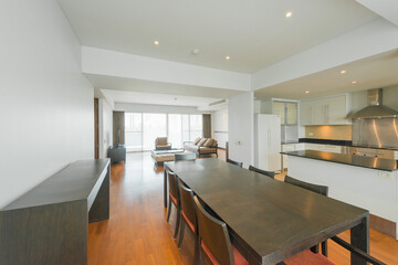 Stylish kitchen interior with dining table and chairs
