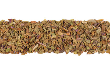 Dried basil leafs macro photo.