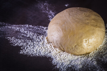 Fresh raw dough for pizza ready to be prepared