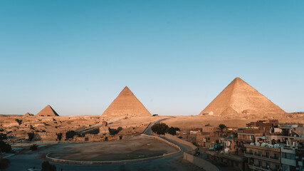 Fototapeta na wymiar The Great Pyramid of Giza, Cairo, Egypt. The atmosphere during sunrise.
