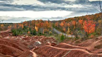 Beautiful landscape of the Cheltenham badlands surrounded by a forest. It is a popular and tourist...