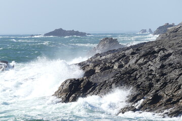 waves crashing on rocks