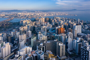 Florianopolis, Santa Catarina, Brazil, downtown buildings seen from the top with cable-stayed bridge in the background, 