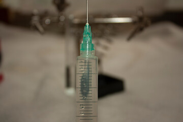 .Syringe filled with vaccine against diseases such as Measles, SARS, Coronavirus, MERS, Tetanus,...