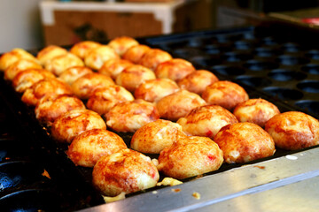 Japanese takoyaki on the grill