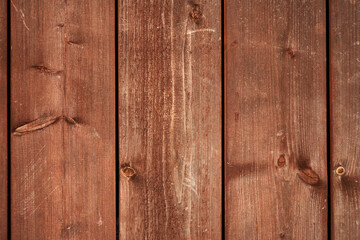 Fototapeta premium Brown wood panels from a hut in daylight. symmetrical, even. Germany.