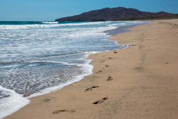 footsteps on beach 