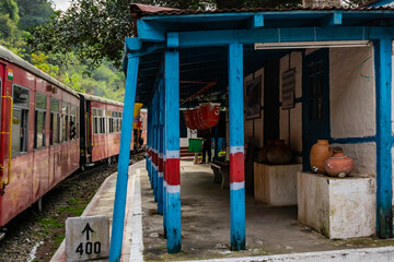 Fototapeta na wymiar railway station with a train passing by, travel concept.
