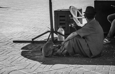 Man with Barbary macaque in Djemaa El Fna Square, Marrakech © Carmen Romero