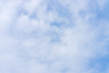 White clouds on a blue sky. White backgrounds