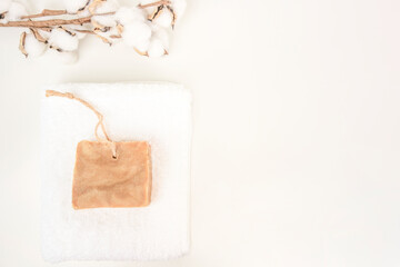 Eco theme, body care products, zero waste concept. Natural handmade soap on a white background, top view, copy space.