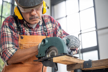 concept of wood DIY at home, carpenter working with wood