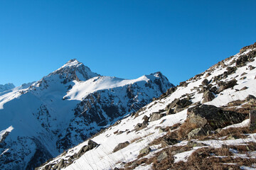 Mountain landscape of snowy Dombay