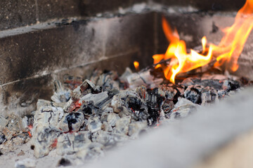 burning charcoal in a fireplace