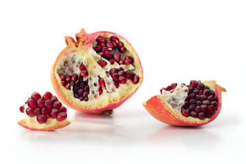 Juicy pomegranate fruit isolated on white background