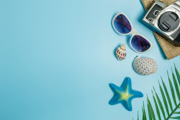 The beach accessories on the blue and blue background. Summer sale beautiful web banner.