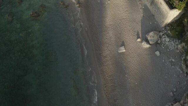 Aerial shot over some boats floating in the sea, in "Conca dei Marini", Amalfi Coast