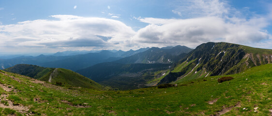 Fototapeta na wymiar Panoramic photo of summer mountain of Tatra ridge, Slovakia, summer in the mountains. Travel and hike