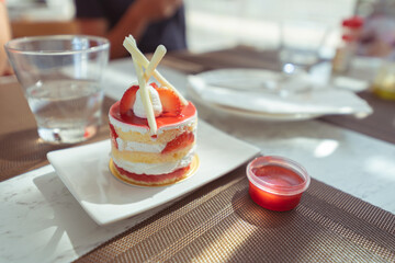 dessert with strawberry and cream