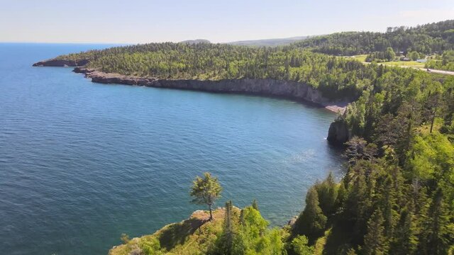 Beautiful landscape on Lake Superior North Shore minnesota, aerial view sunny summer afternoon, green threes and clear water lake