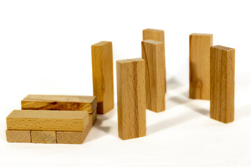 Wooden game blocks, just started building up, pieces stand vertical