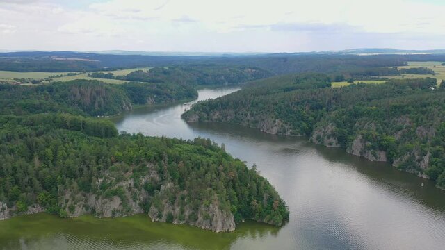 Aerial view of confluence of two rivers Vltava and Otava next to medieval castle Zvikov, Czech republic