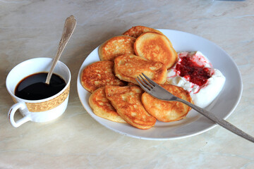 breakfast with pancakes on a summer morning