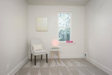 empty room with window and chair