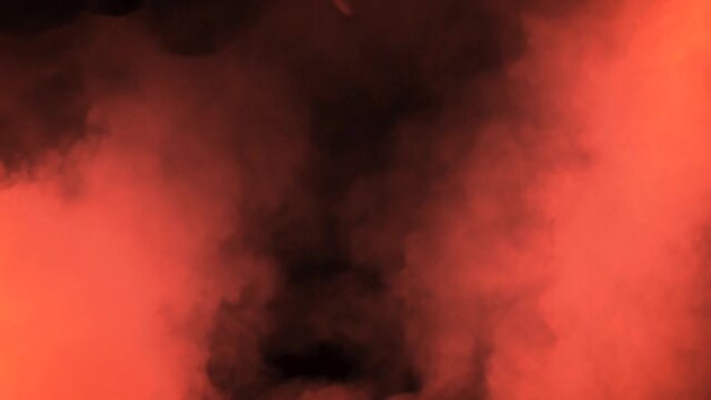 Red smoke and stroboscope lights effects. Footage. Slowmotion of smoke on the black background. 50 FPS