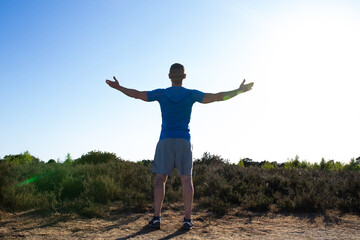 man worshipping life and the weather