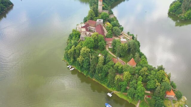 Aerial view on czech medieval castle Zvikov, situated on rocky outcrop above the confluence of two rivers Vltava and Otava, Czech republic