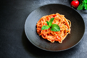 spaghetti pasta tomato sauce
serving size second course. food background top view copy space for...